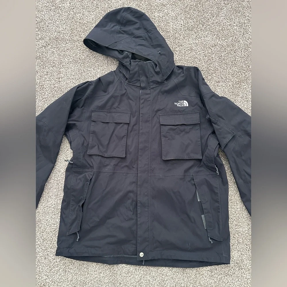 The North Face Black Hooded Raincoat with Multiple Front Pockets